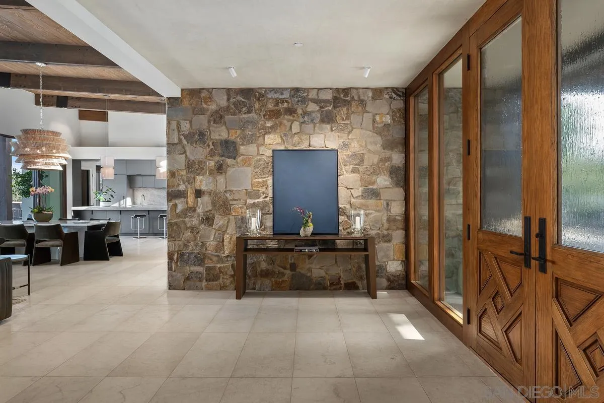 4728 El Aspecto Rancho Santa Fe, CA 92067 - Photo 15 of 34 a living room with furniture