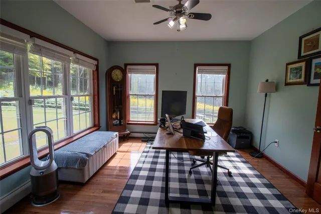 a living room with furniture and a window