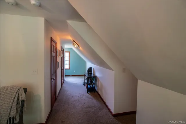 a bed room with a bed and a chandelier