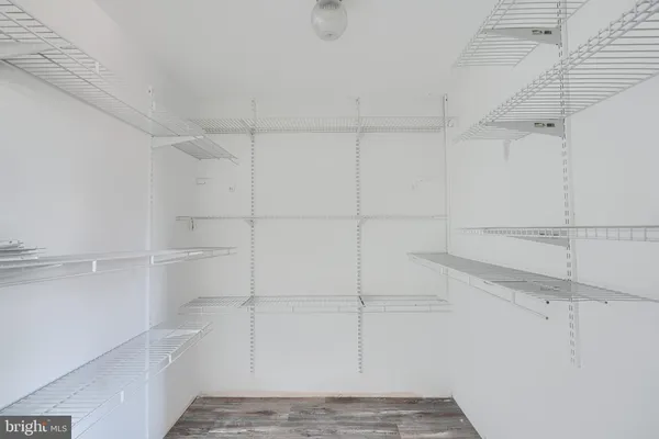 a view of an empty walk in closet