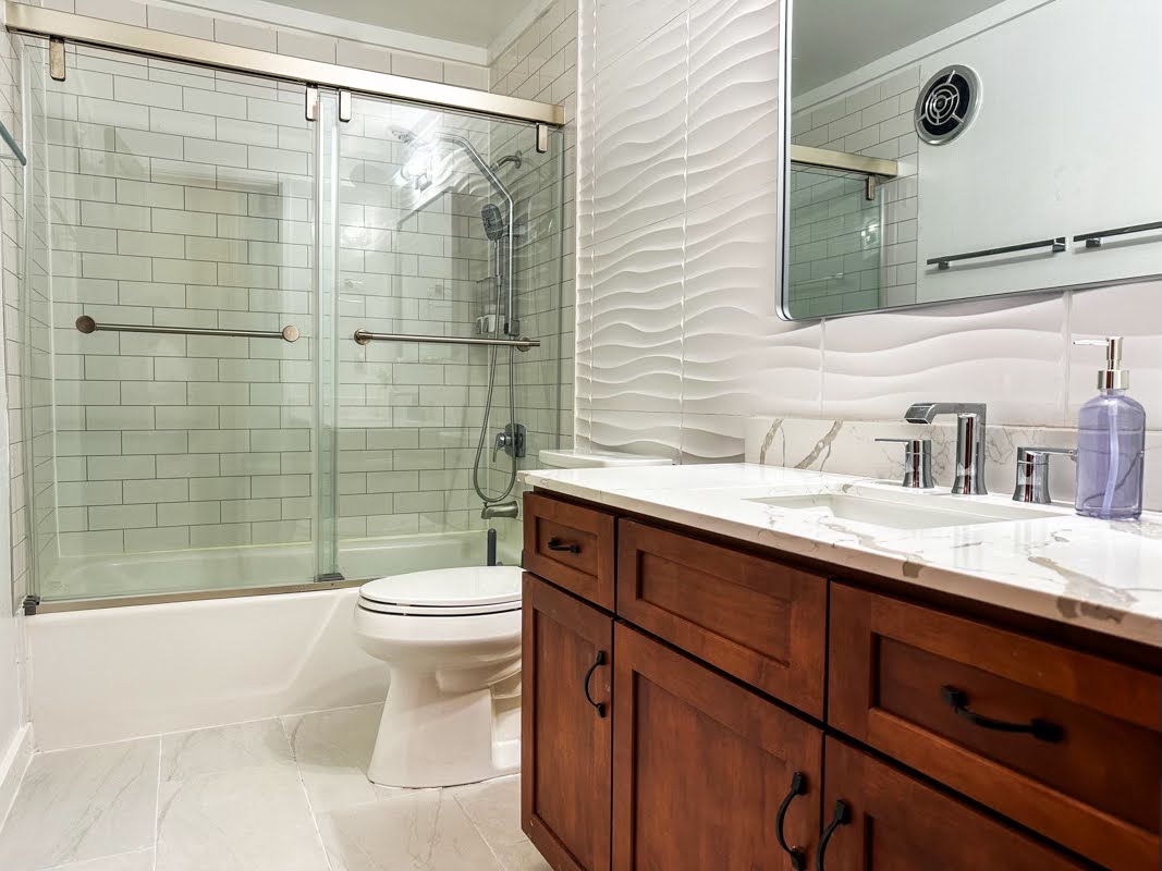 3920 Wyllie Road, Unit F20 Princeville, HI 96722 - Photo 17 of 25 a bathroom with a sink a toilet and shower
