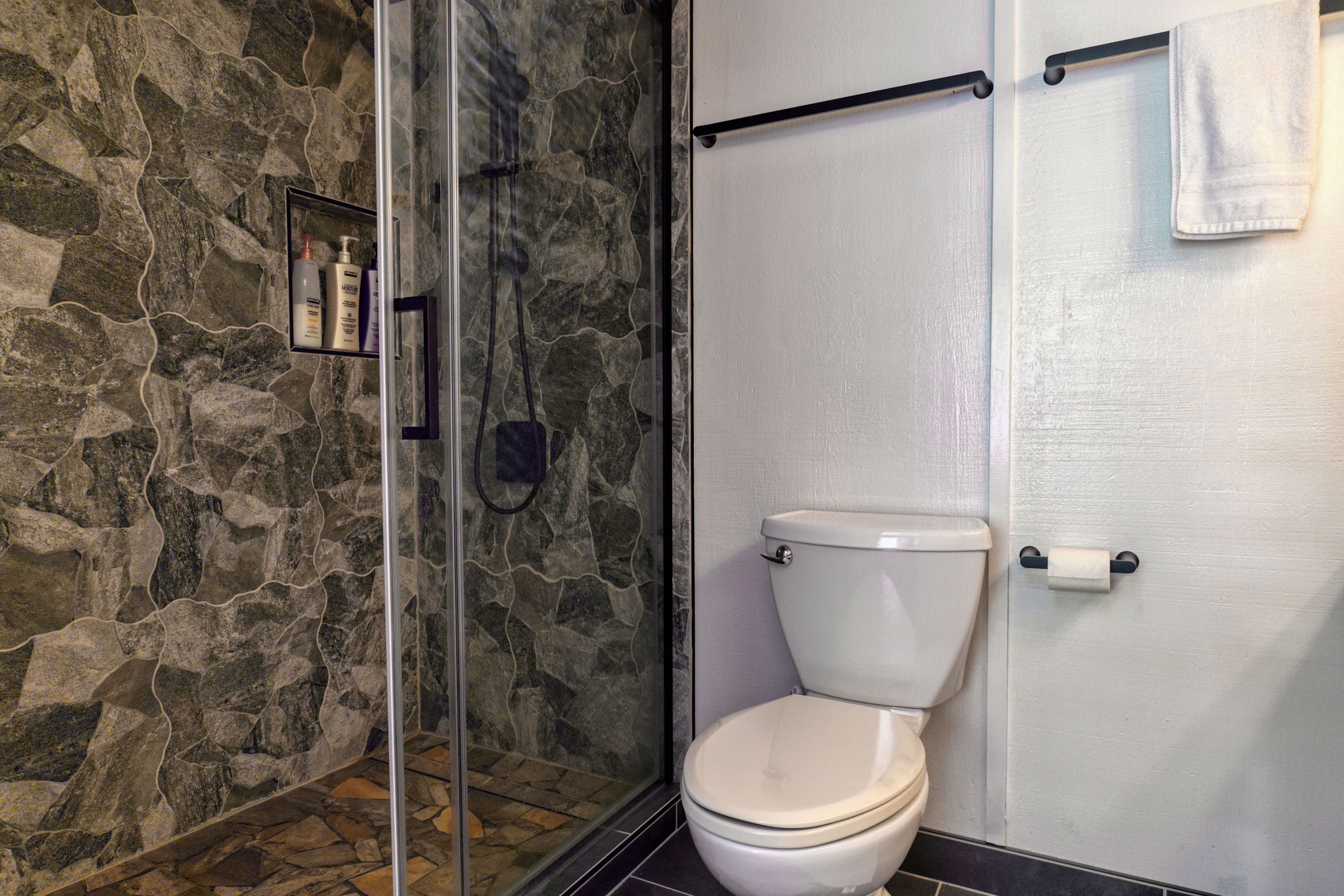 3920 Wyllie Road, Unit F20 Princeville, HI 96722 - Photo 10 of 25 a white toilet sitting next to a shower