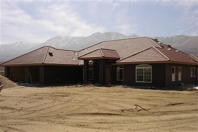 9640 High Road Lucerne Valley, CA 92356 - Photo 1 of 1 a front view of a house with a yard