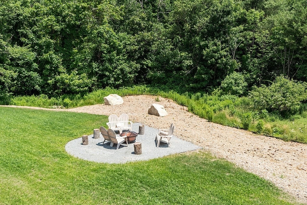 94 Fitchburg Road, Unit 3 Townsend, MA 01469 - Photo 34 of 37 a view of a swimming pool with a yard