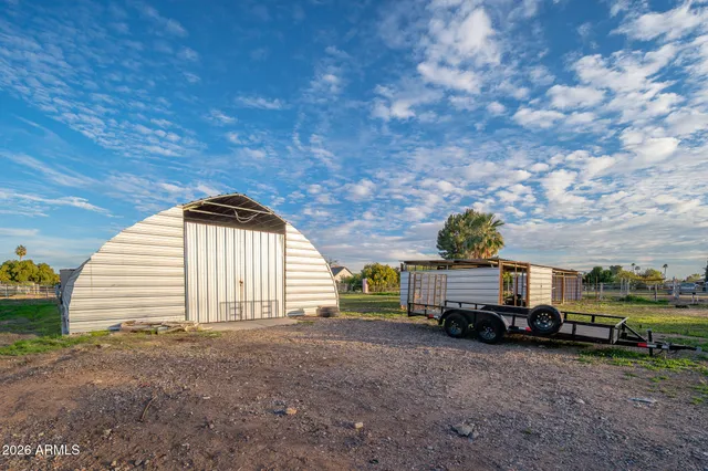 a view of a house with a back yard