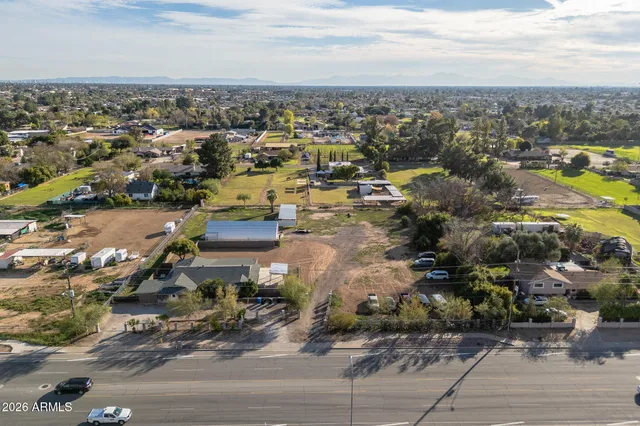 a view of a chairs and table in the house