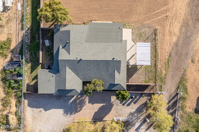 a view of a lake with boats and trees in the background