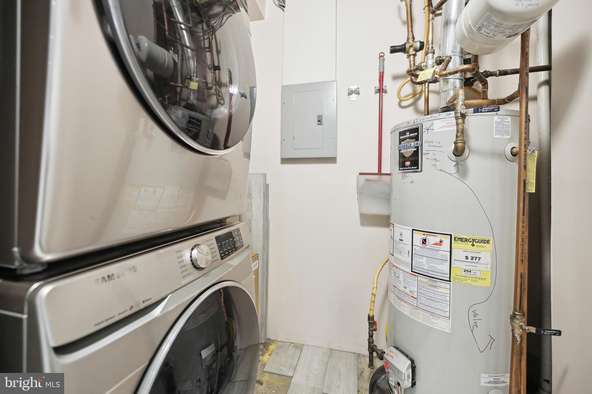 1300 13th Street Northwest, Unit 108A Washington, DC 20005 - Photo 18 of 34 a utility room with dryer and washer