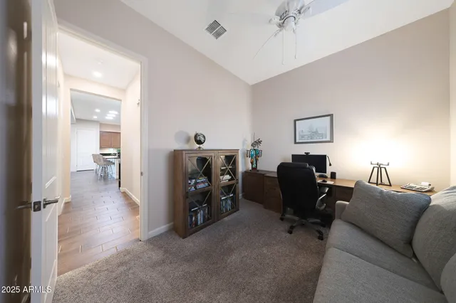 a view of a swimming pool with a garden