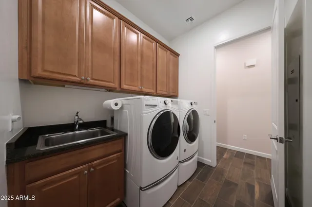 a view of a backyard with sitting area