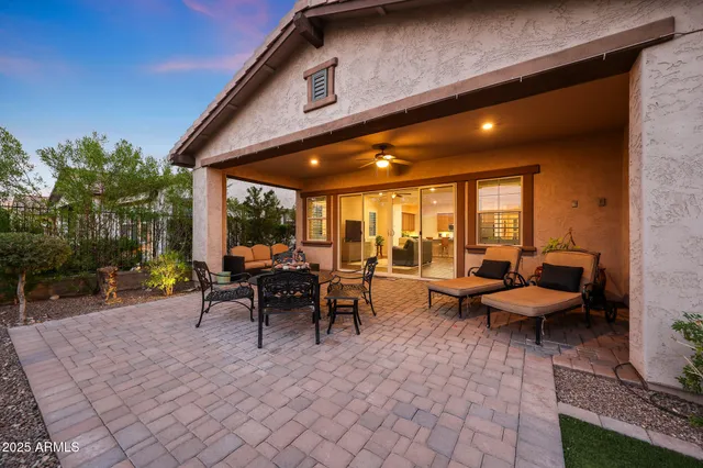 a view of a chairs and table in the terrace