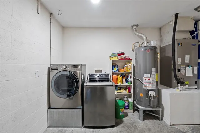 a view of a storage & utility room with washer and dryer