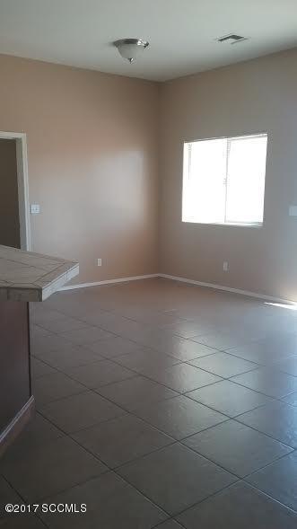 84 Altar Court Rio Rico, AZ 85648 - Photo 3 of 7 a view of an empty room with a window