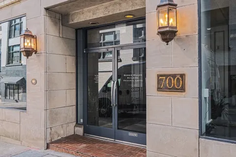 a view of a brick wall door and an outdoor space