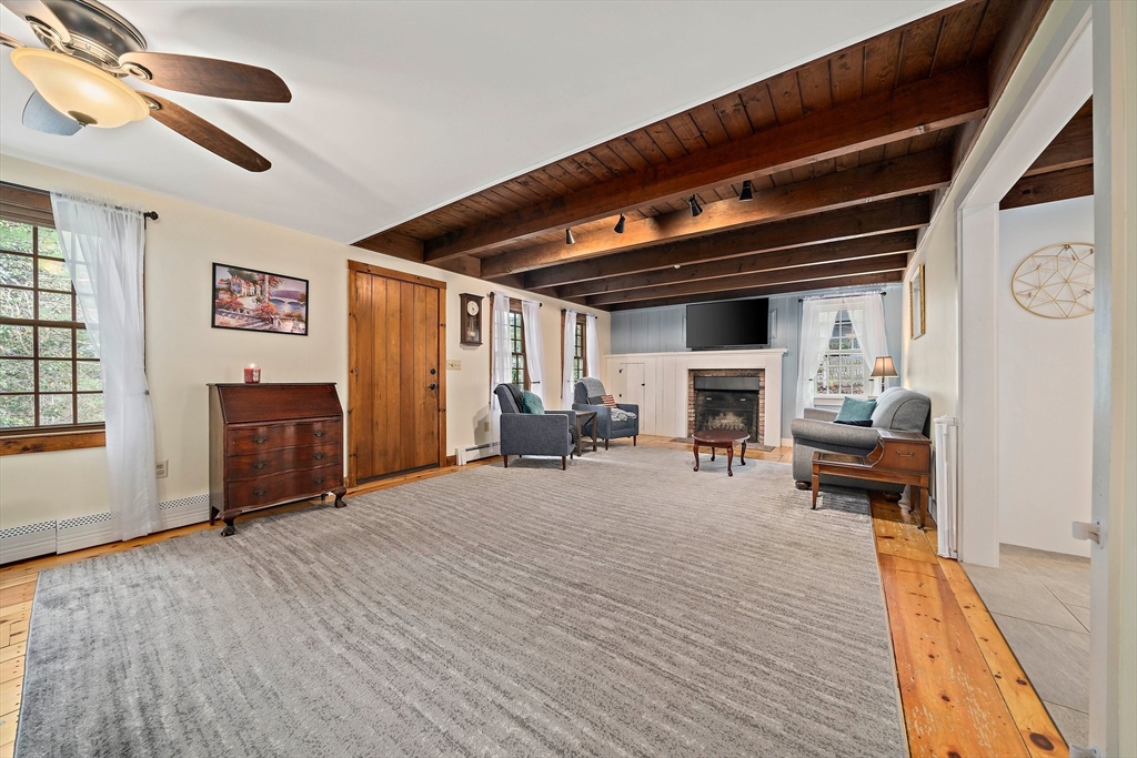 372 Winter Street Walpole, MA 02081 - Photo 14 of 42 a view of livingroom with furniture and fireplace