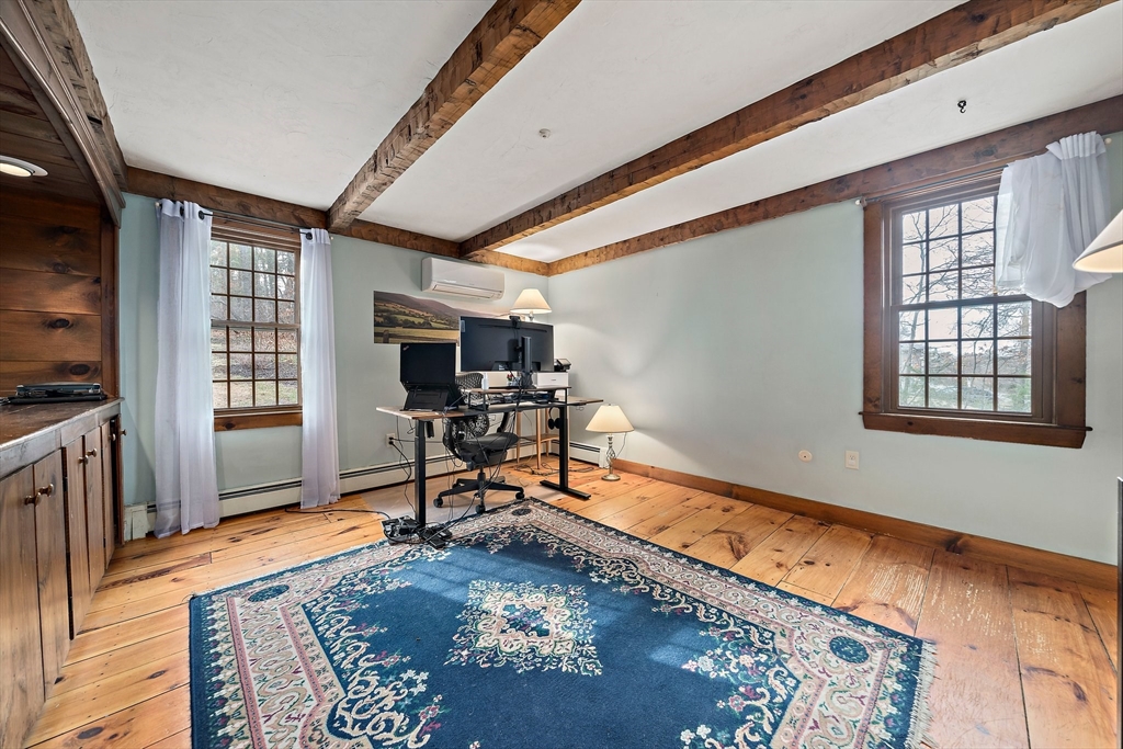 372 Winter Street Walpole, MA 02081 - Photo 15 of 42 a living room with furniture and a flat screen tv
