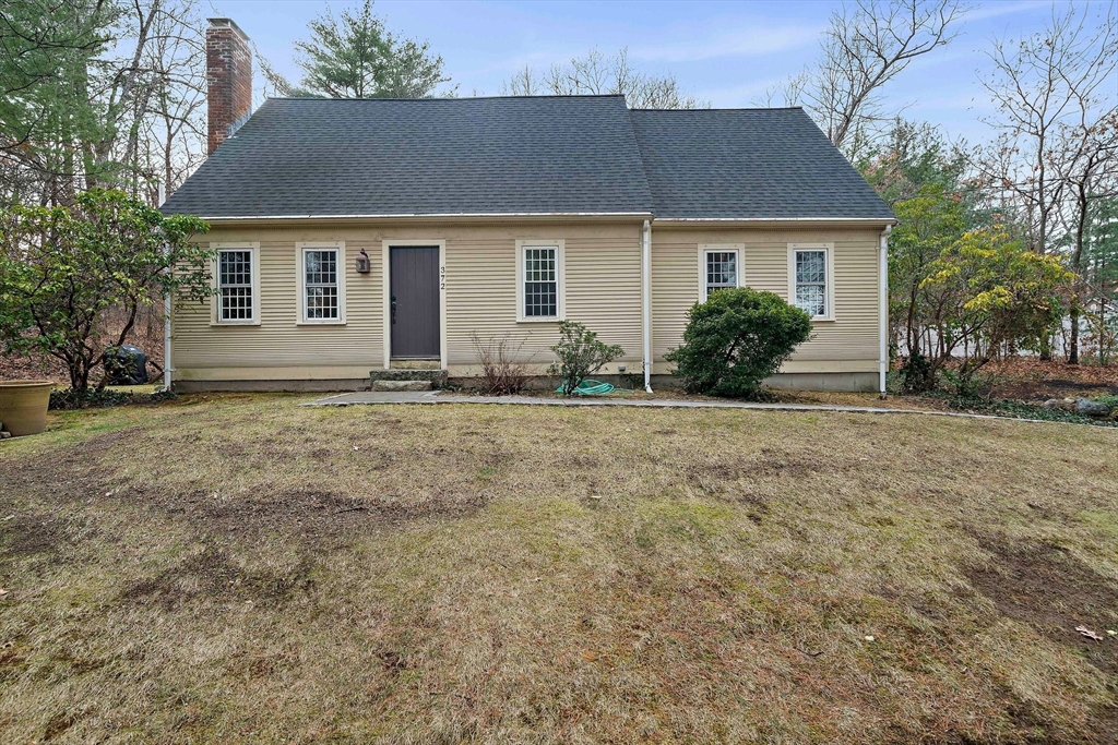 372 Winter Street Walpole, MA 02081 - Photo 2 of 42 a front view of a house with a yard
