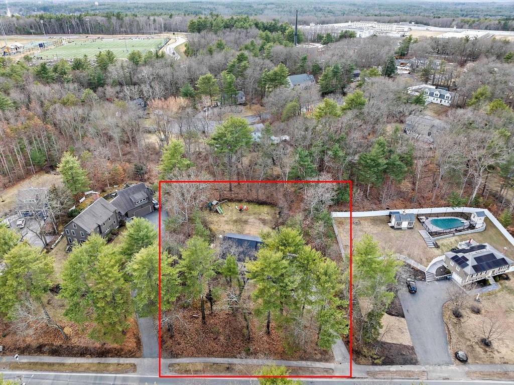 372 Winter Street Walpole, MA 02081 - Photo 36 of 42 an aerial view of a house with a yard