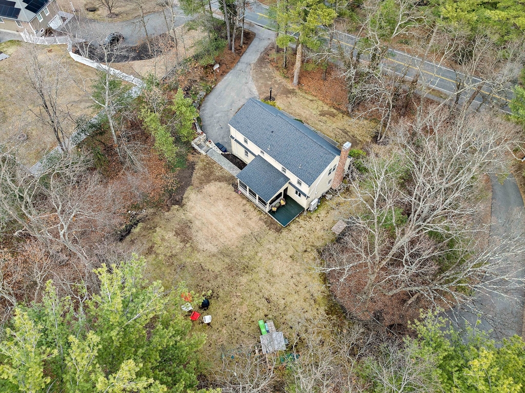 372 Winter Street Walpole, MA 02081 - Photo 42 of 42 an aerial view of a house with a yard and trees