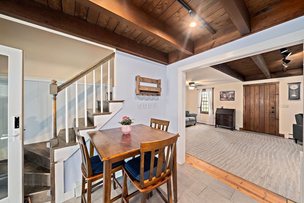 372 Winter Street Walpole, MA 02081 - Photo 8 of 42 a view of a dining room with furniture