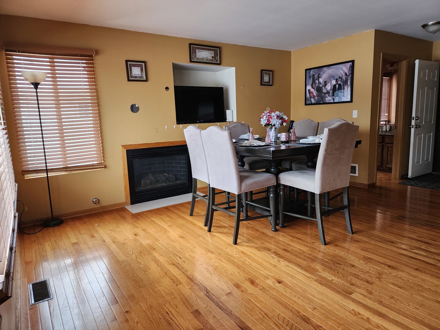2216 Beechwood Road Joliet, IL 60432 - Photo 11 of 19 a view of a dining room with furniture window and wooden floor