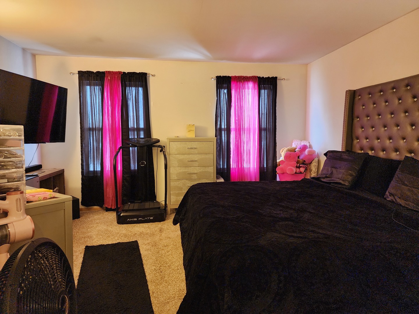 2216 Beechwood Road Joliet, IL 60432 - Photo 13 of 19 a bedroom with a bed closet and a flat tv screen