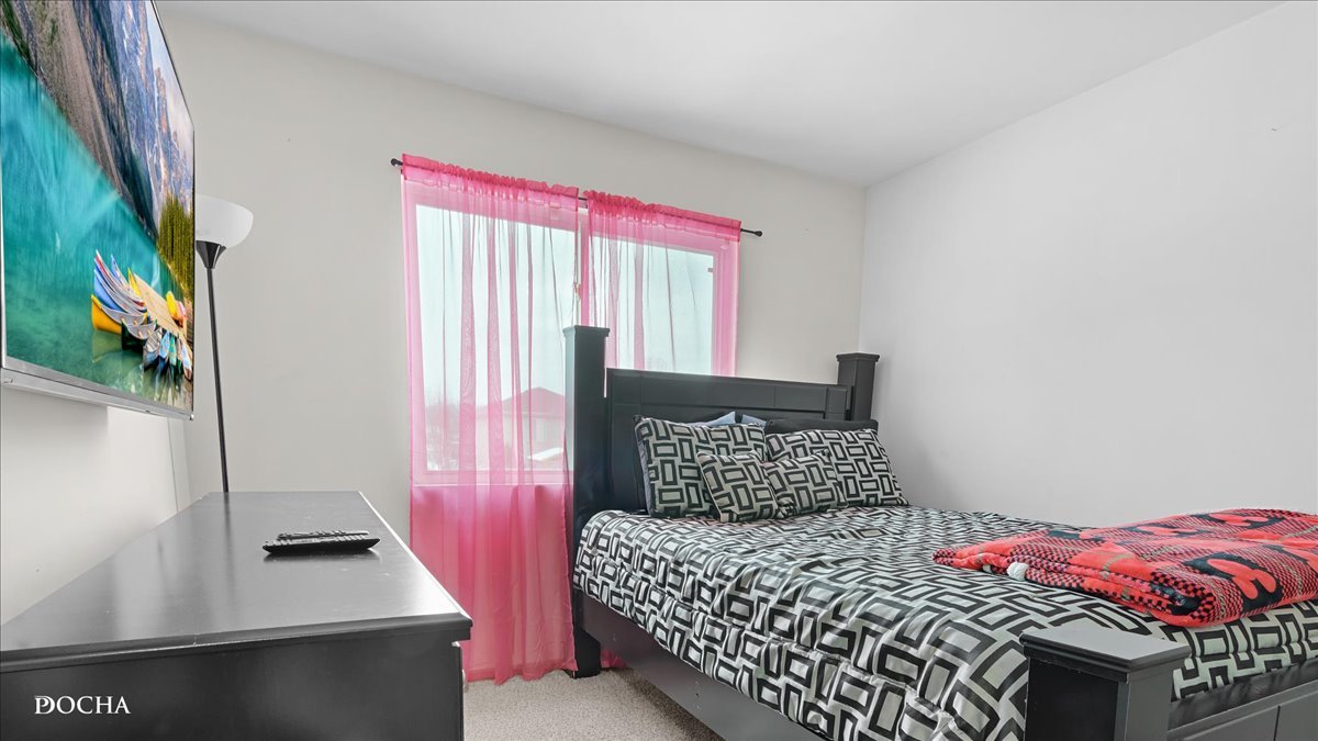 2216 Beechwood Road Joliet, IL 60432 - Photo 15 of 21 a bedroom with a bed and a window