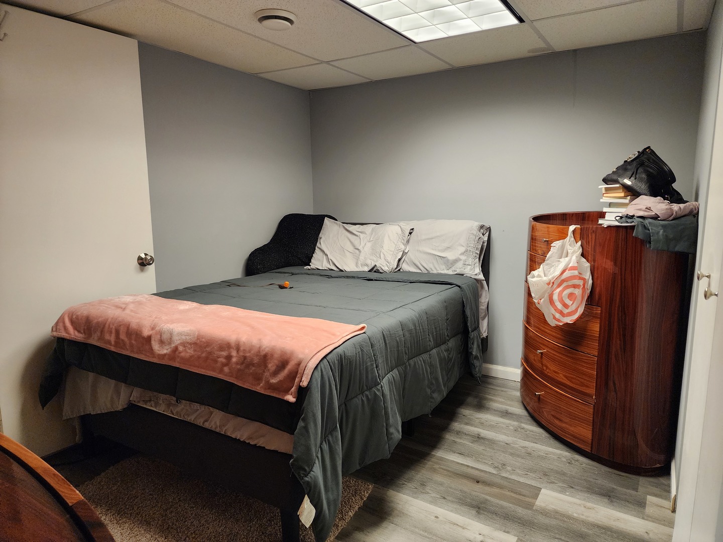 2216 Beechwood Road Joliet, IL 60432 - Photo 16 of 19 a bedroom with a bed and a dresser
