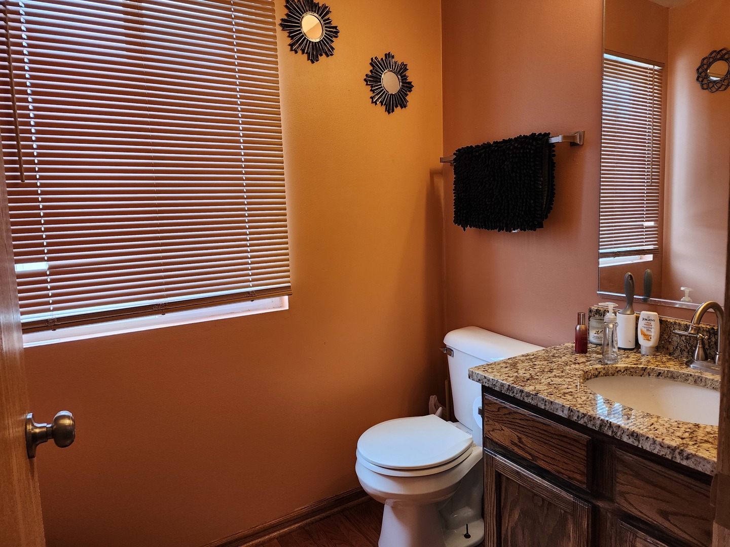 2216 Beechwood Road Joliet, IL 60432 - Photo 18 of 19 a bathroom with a granite countertop toilet sink and mirror