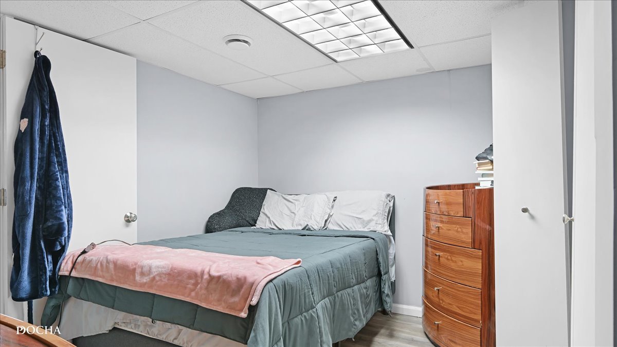 2216 Beechwood Road Joliet, IL 60432 - Photo 20 of 21 a bedroom with a bed and a dresser