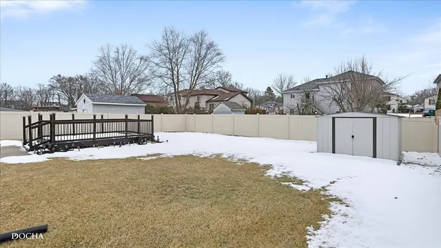 a view of a backyard of snow