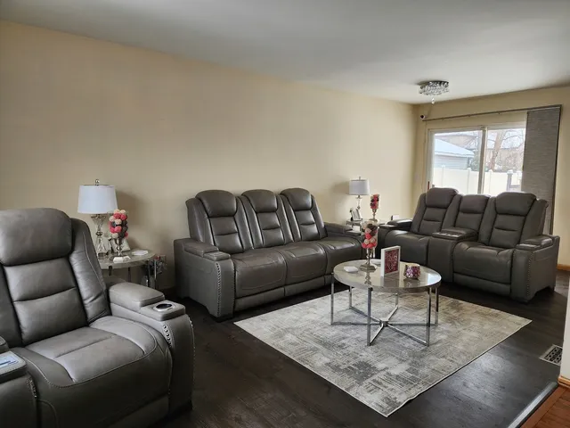 a living room with furniture and a couch