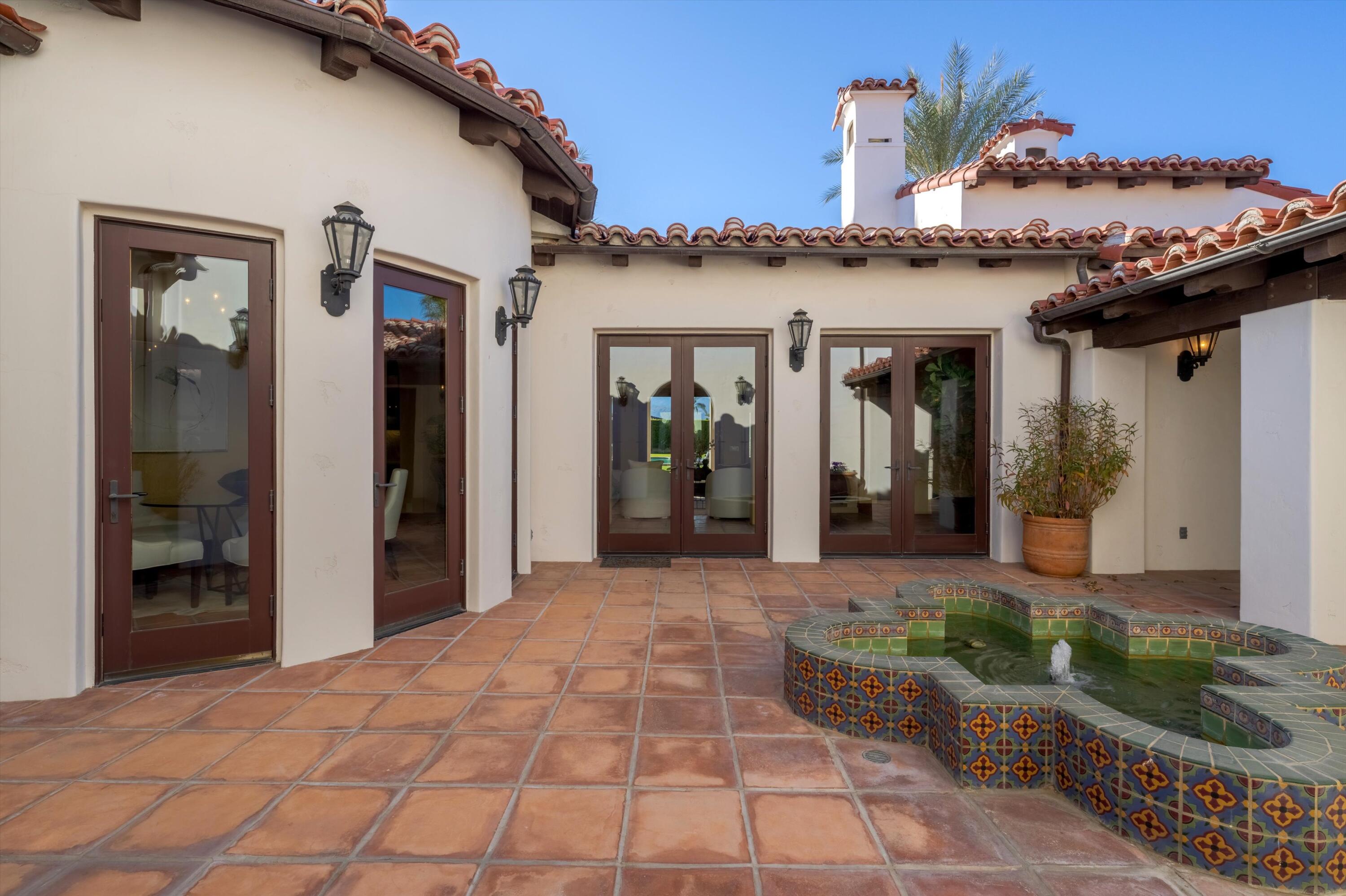 2 Serrano Way Rancho Mirage, CA 92270 - Photo 19 of 76 a view of a entryway door front of house