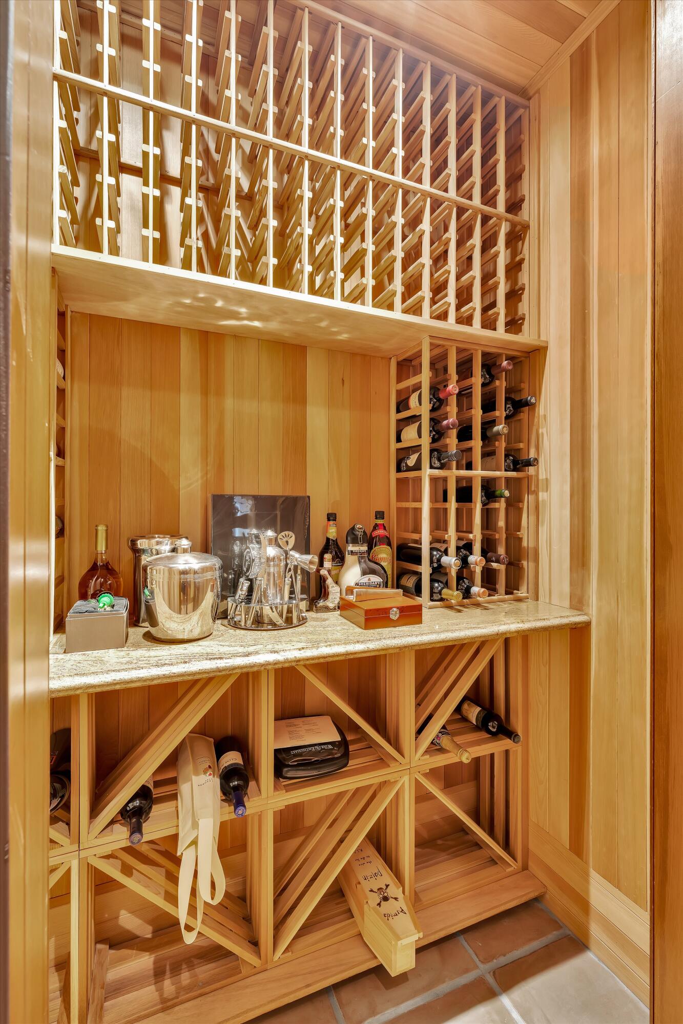 2 Serrano Way Rancho Mirage, CA 92270 - Photo 54 of 76 a view of a kitchen with a sink and cabinets