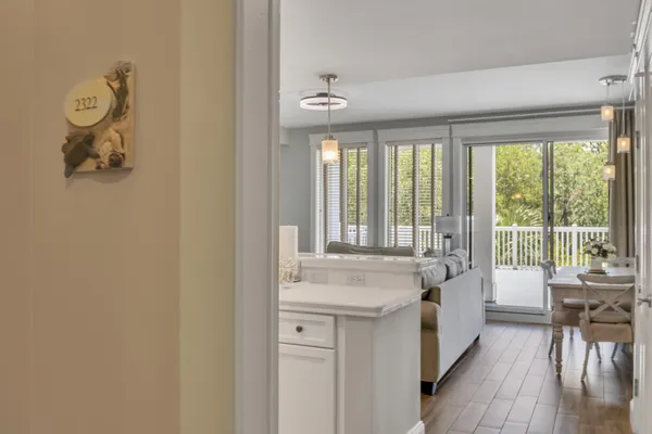 a spacious bathroom with a granite countertop a sink and a window