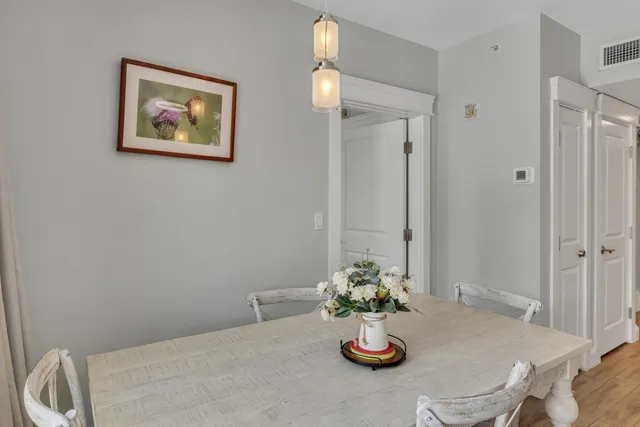 a view of a dining room with furniture