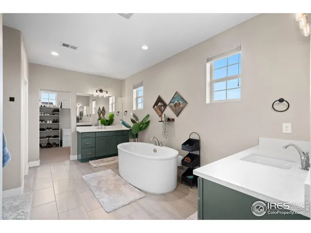 a bathroom with a sink a toilet and bathtub