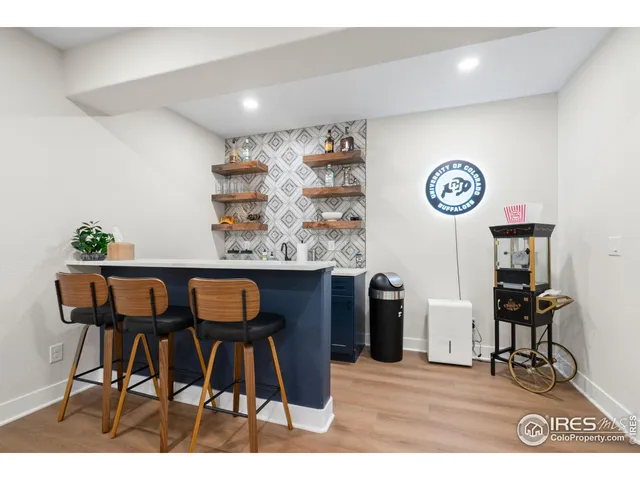 a view of a dining room and kitchen