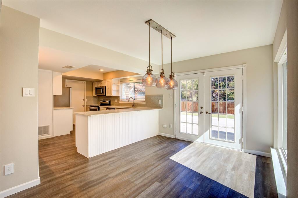 3728 Blue Bonnet Court Flower Mound, TX 75028 - Photo 13 of 40 a view of kitchen with furniture and wooden floor