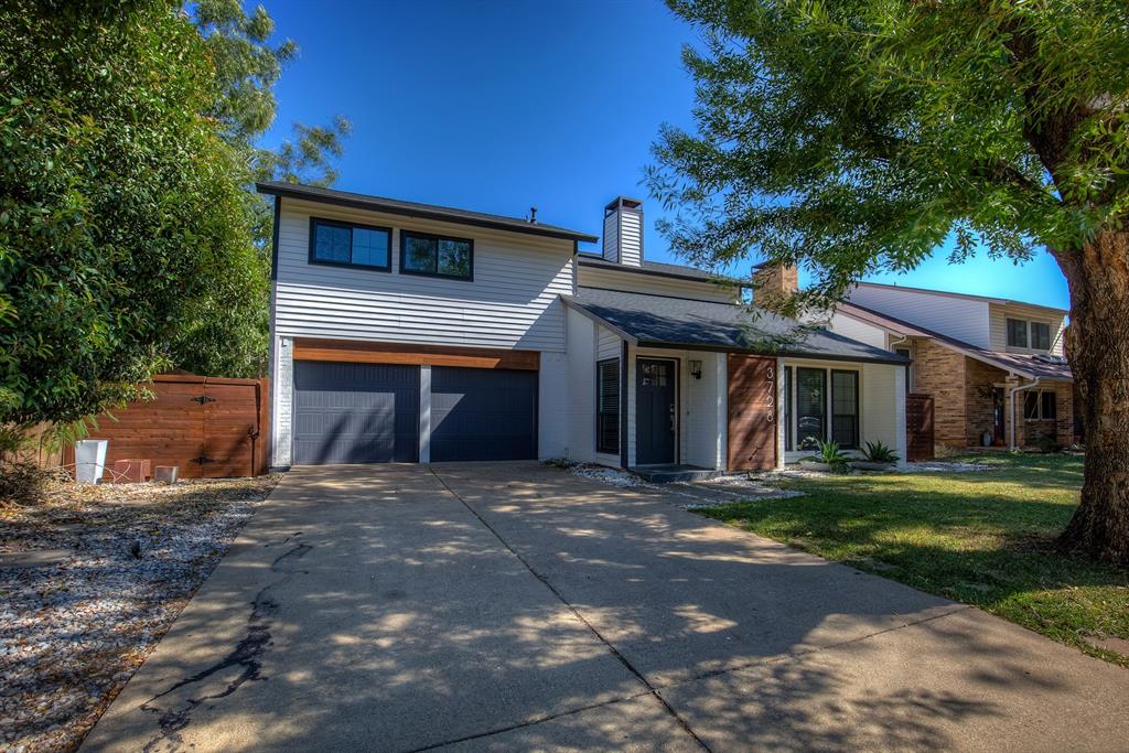 3728 Blue Bonnet Court Flower Mound, TX 75028 - Photo 2 of 40 a front view of a house with a yard