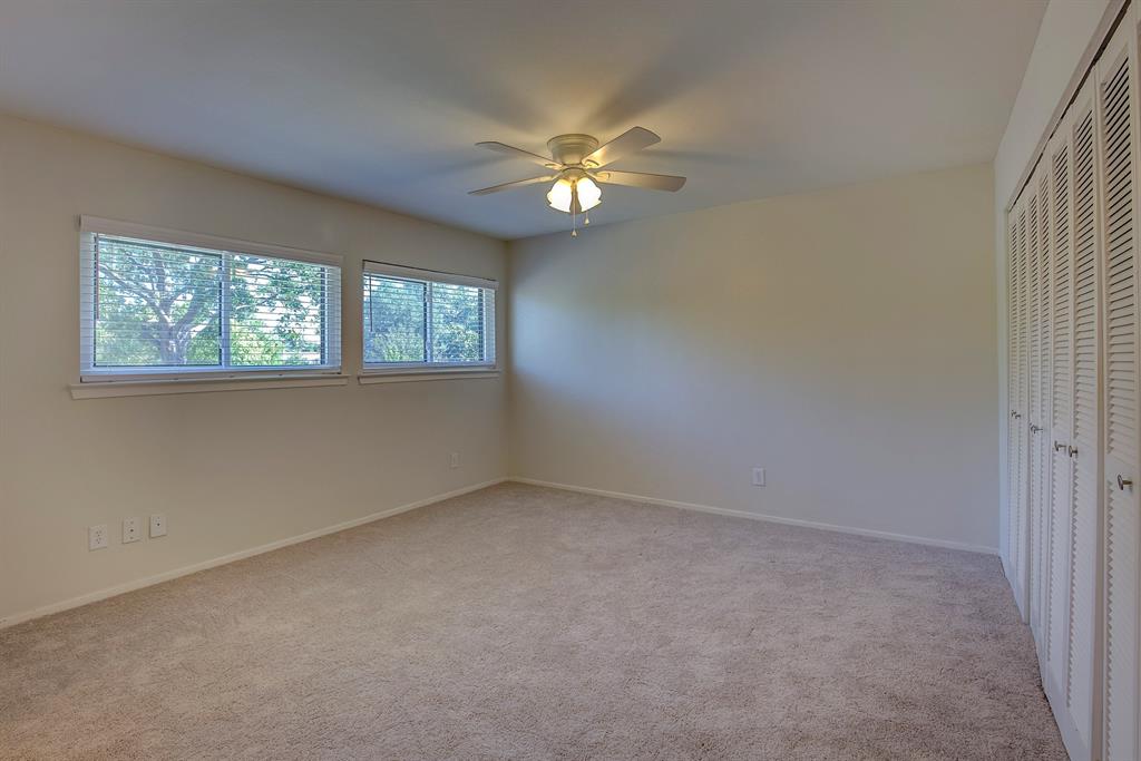 3728 Blue Bonnet Court Flower Mound, TX 75028 - Photo 23 of 40 an empty room with windows and fan