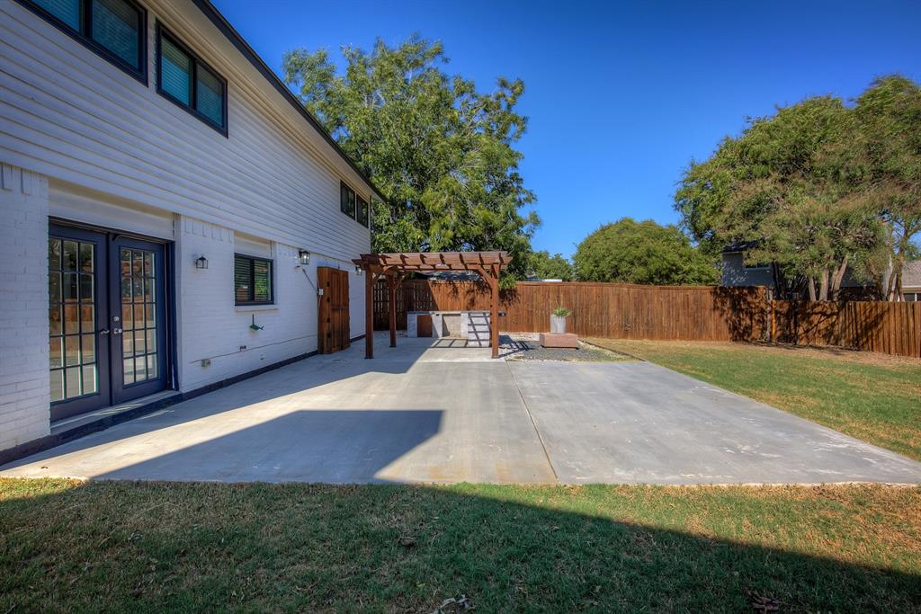 3728 Blue Bonnet Court Flower Mound, TX 75028 - Photo 35 of 40 a view of backyard with large trees