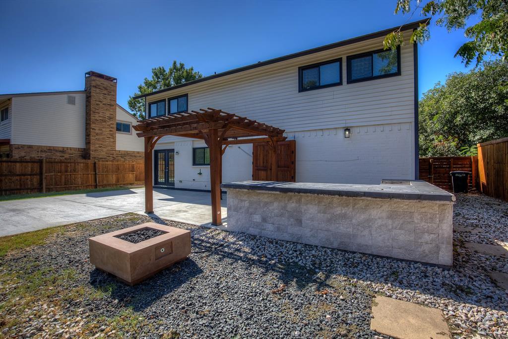 3728 Blue Bonnet Court Flower Mound, TX 75028 - Photo 38 of 40 a front view of a house with a yard