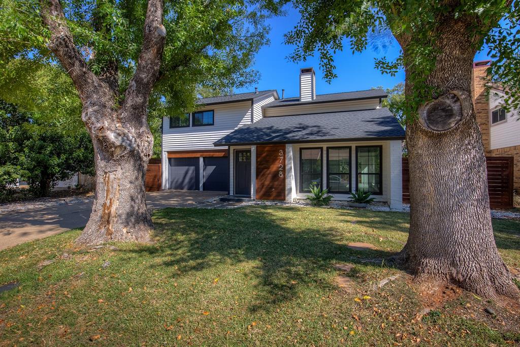 3728 Blue Bonnet Court Flower Mound, TX 75028 - Photo 4 of 40 a front view of a house with garden