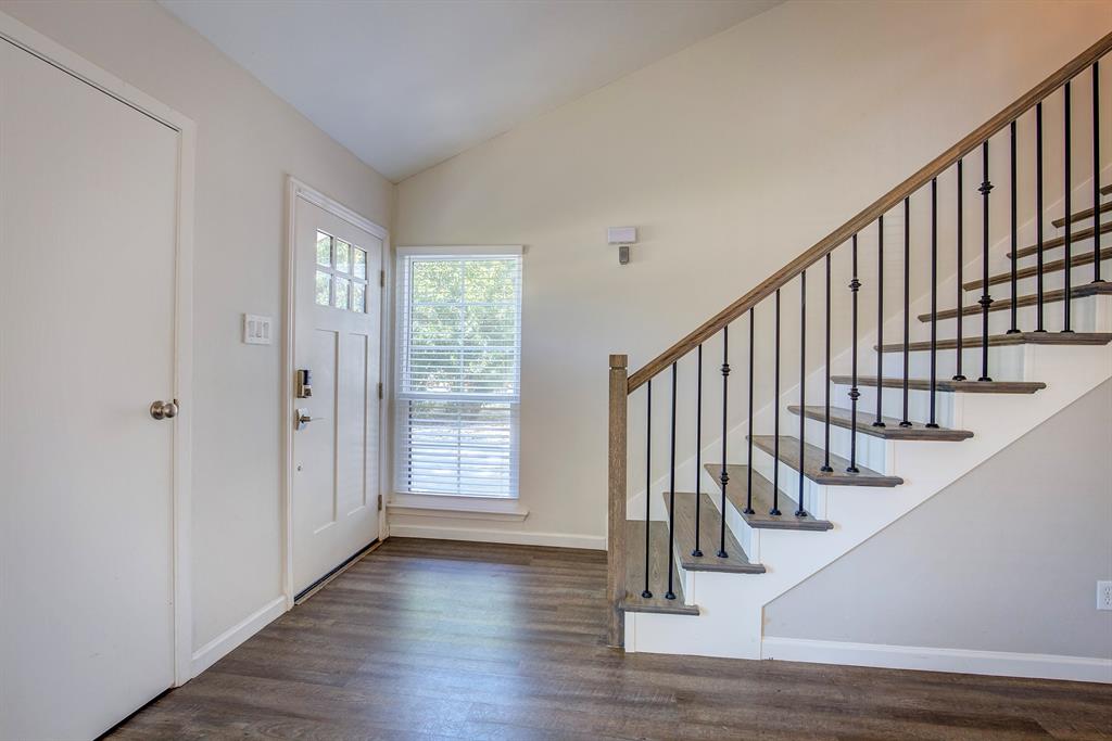 3728 Blue Bonnet Court Flower Mound, TX 75028 - Photo 7 of 40 a view of entryway with wooden floor and stairs