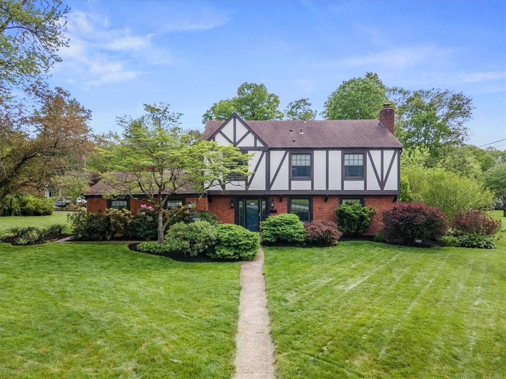 1220 Rolling Meadow Road Pittsburgh, PA 15241 - Photo 1 of 46 a front view of a house with a yard