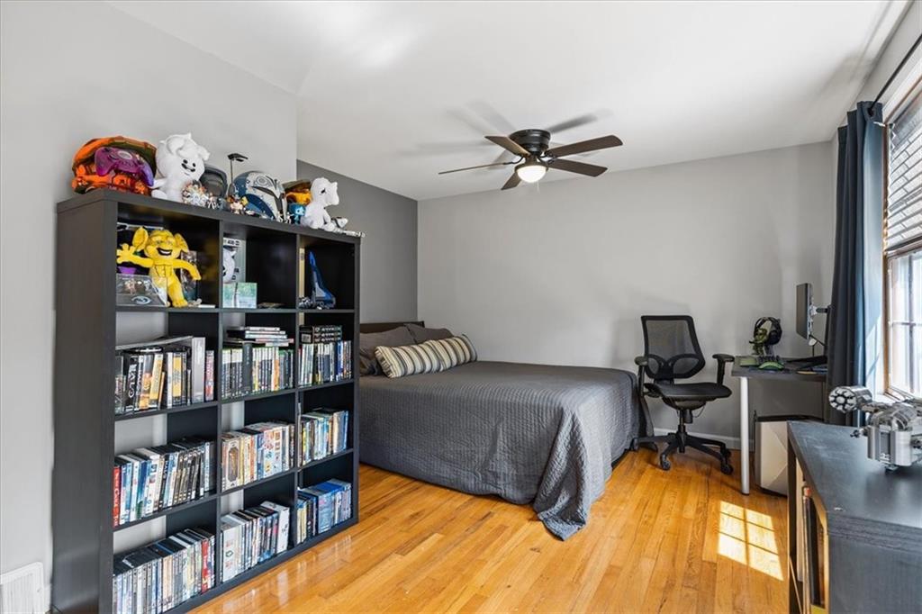 1220 Rolling Meadow Road Pittsburgh, PA 15241 - Photo 18 of 46 a bedroom with a bed furniture and a book shelf