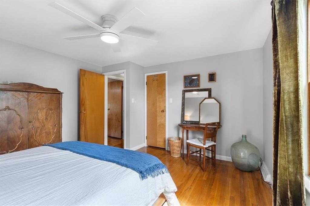 1220 Rolling Meadow Road Pittsburgh, PA 15241 - Photo 23 of 46 a bedroom with a bed and a chandelier