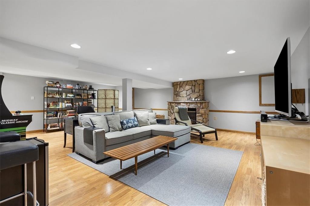 1220 Rolling Meadow Road Pittsburgh, PA 15241 - Photo 28 of 46 a living room with furniture and a flat screen tv