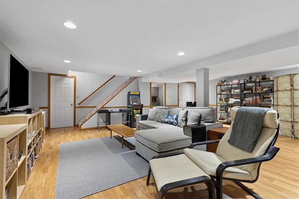 1220 Rolling Meadow Road Pittsburgh, PA 15241 - Photo 29 of 46 a living room with furniture and a flat screen tv